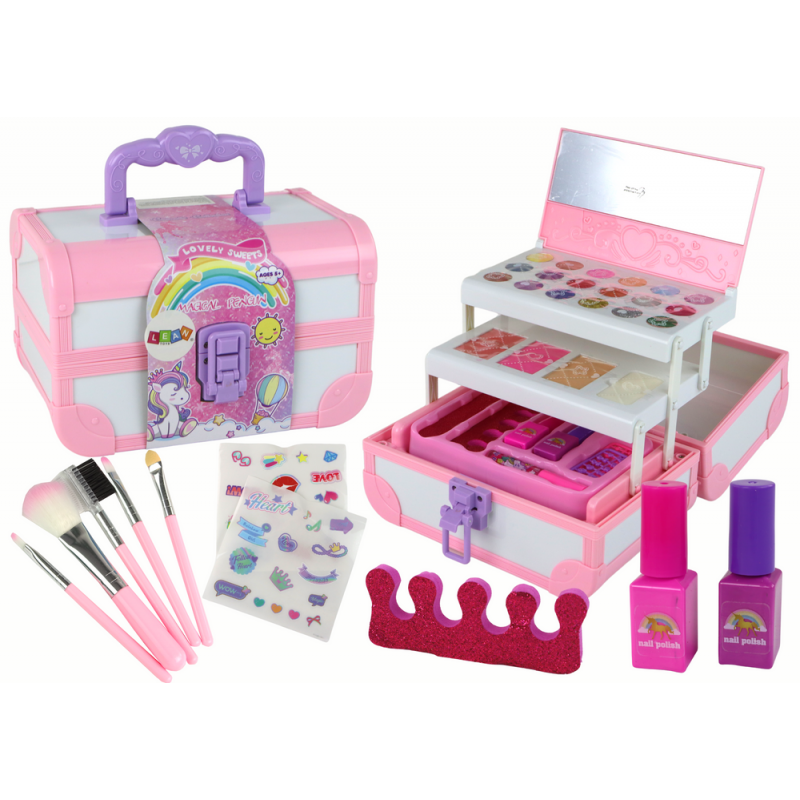 Set of beauty cosmetics for make-up doing nails in a pink case