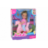 Baby doll for children on a rocking chair, pink rocking horse