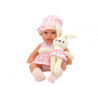 Baby doll in a bunny carrier in a pink checkered outfit