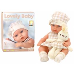 Baby doll in a carrier, a bunny, in a checkered outfit, beige