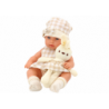Baby doll in a carrier, a bunny, in a checkered outfit, beige