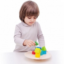 A balancing toy, blocks and a Classic World stand