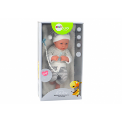 Baby doll in white and gray striped clothes, hat, pacifier, quilt