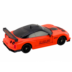 Remote Controlled R/C Sports Car 1:24 Orange Interchangeable Wheels